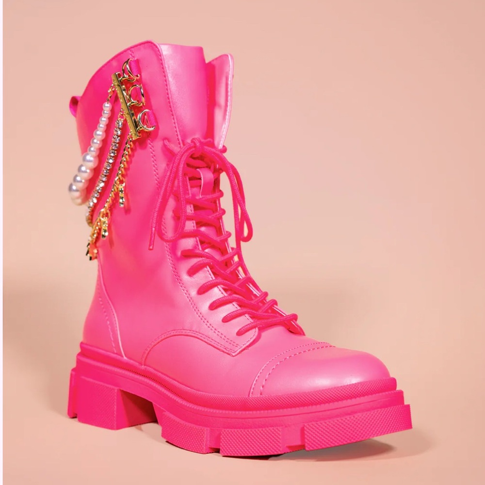 She is Cheval, 1980 Year of the Lady pink combat boots